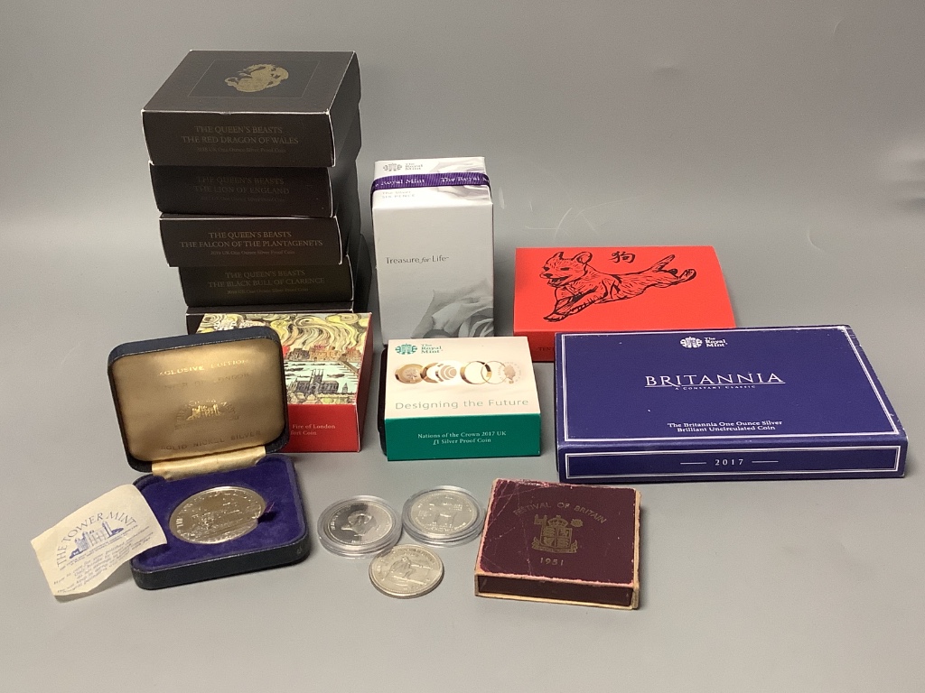 A group of Royal Mint UK proof and brilliant uncirculated coins.